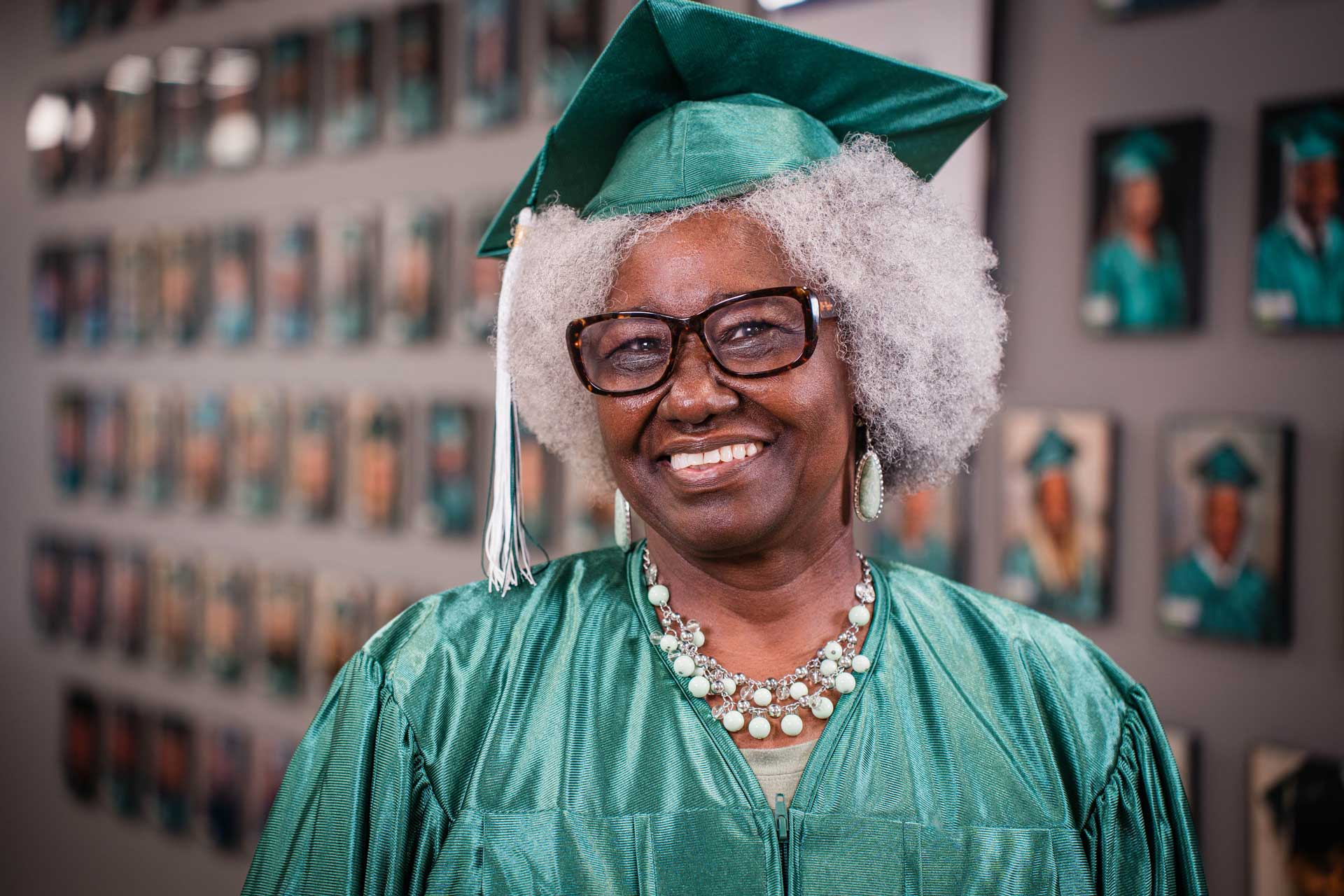 Give to good 3 Woman in cap and gown ready for graduation